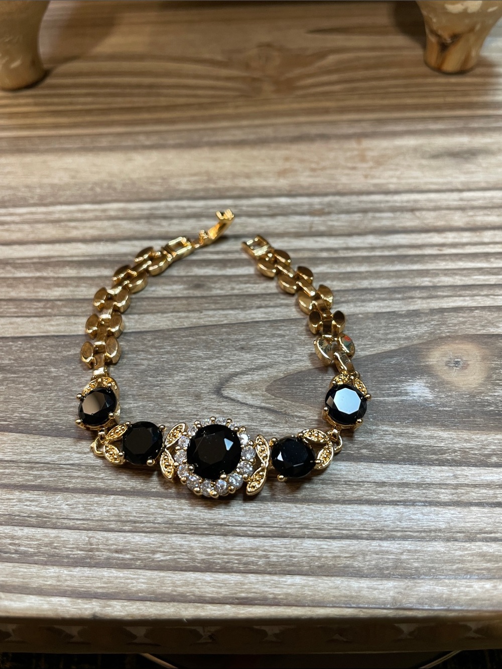 Gold-Tone Bracelet with Black Glass Gemstones and Clear Accents